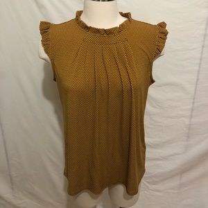 Polka dot sleeveless ruffled top